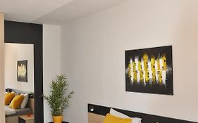 Maxim Apartments